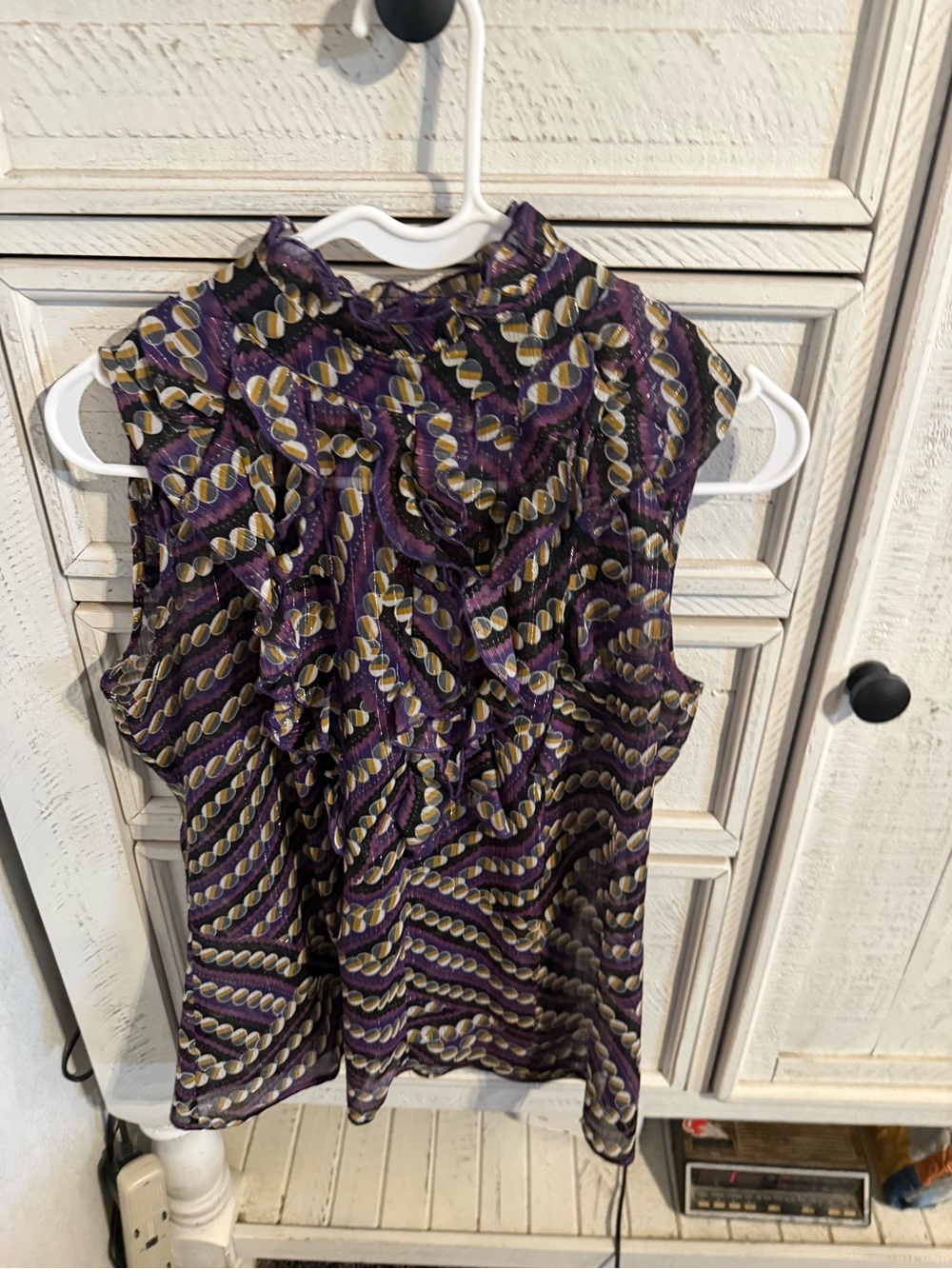 XOXO Purple Sleeveless Ruffle-Neck Blouse with Gold Print